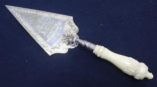 An electroplate and ivory handled trowel